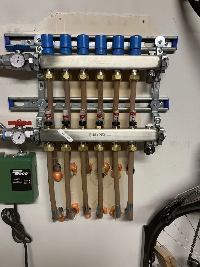 Plumber performing Water Heater Repair at a residential property in Mansfield