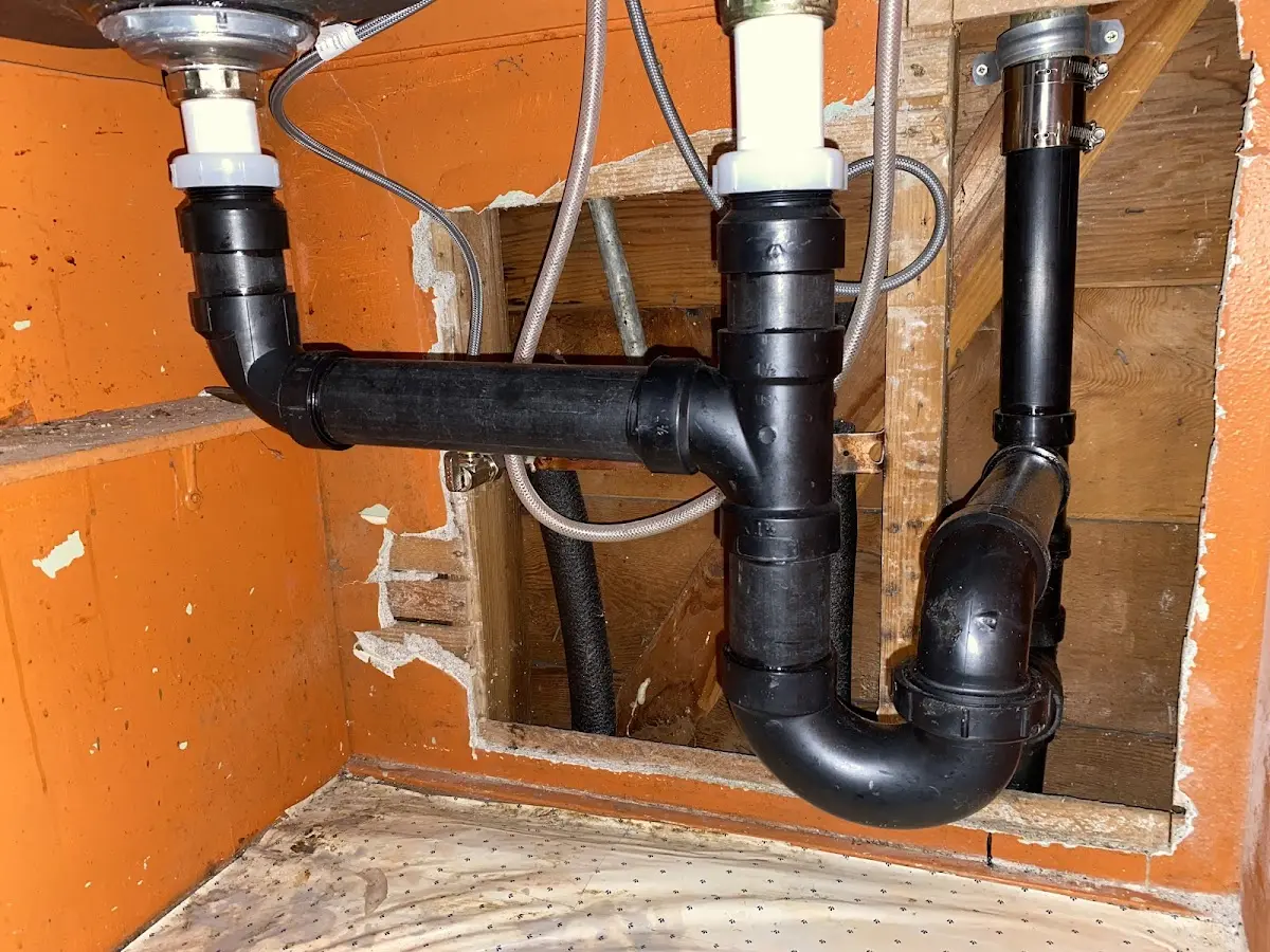 Professional Garbage Disposal Repair equipment and tools on the job in Mansfield